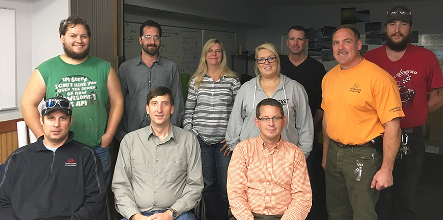 Landscape Structures employees pose for a group photo.